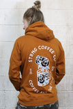 STRONG COFFEE unisex pullover hoodie brown leather view from the back woman